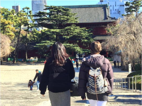 Anna walking with a friend in Tokyo